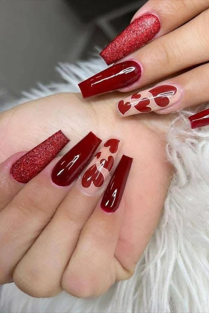 Long red gel manicure with heart accents, Charlotte NC nail service